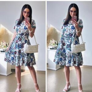 Baltai marga suknelė